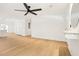 Bright living room featuring hardwood floors, neutral paint, and modern lighting at 2910 3Rd Sw Ave, Atlanta, GA 30315