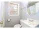 Bathroom features a sleek white vanity, toilet, and shower with modern finishes at 491 Bolton Nw Rd, Atlanta, GA 30331