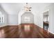 A spacious bedroom featuring beautiful hardwood floors, a ceiling fan, and plenty of natural light at 931 New Bedford, Marietta, GA 30068