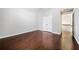 A spacious bedroom features hardwood floors, fresh paint, and a large closet at 931 New Bedford, Marietta, GA 30068