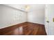 Neutral bedroom featuring hardwood floors, fresh paint, closet, and lots of natural light at 931 New Bedford, Marietta, GA 30068