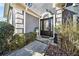 Inviting front entrance with stone walkway and decorative potted plants at 931 New Bedford, Marietta, GA 30068