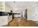 Spacious kitchen with stainless steel appliances, custom cabinetry, and granite countertops at 931 New Bedford, Marietta, GA 30068