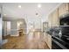 Lovely kitchen area featuring stainless steel appliances, tile flooring, and granite counters at 931 New Bedford, Marietta, GA 30068