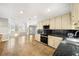 Open kitchen area featuring granite counters, stainless appliances, and tile floors at 931 New Bedford, Marietta, GA 30068