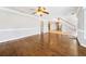 Bright living room with hardwood floors and staircase at 931 New Bedford, Marietta, GA 30068