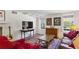 Cozy living room featuring hardwood floors, comfortable seating, and a decorative rug at 435 Collier Nw Rd, Atlanta, GA 30309