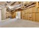 Unfinished basement with exposed framing and ductwork, perfect for storage or future renovation at 5060 Governors Walk Dr, Canton, GA 30115