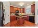 Inviting kitchen with stainless steel appliances, granite countertops, and a center island, great for entertaining at 5890 Vinyard Ln, Cumming, GA 30041