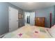 Inviting bedroom featuring a cozy quilt and neutral decor at 946 Gardenia Curv, Canton, GA 30114