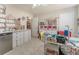 Well-organized craft room with built-in storage, workspace, and natural light at 946 Gardenia Curv, Canton, GA 30114