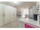 Bright craft room featuring large storage cabinets and workspace at 946 Gardenia Curv, Canton, GA 30114