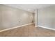 Unfinished basement with tile flooring and recessed lights, ready for customization and storage at 2002 Stonewick Ct, Lawrenceville, GA 30043