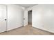 Neutral bedroom with carpet and open door that provides access to additional rooms at 2002 Stonewick Ct, Lawrenceville, GA 30043