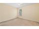 Bedroom with plush carpet, a window, and a ceiling fan for added comfort at 2002 Stonewick Ct, Lawrenceville, GA 30043
