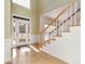 Inviting foyer with a staircase and tiled flooring at 2002 Stonewick Ct, Lawrenceville, GA 30043