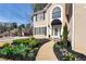 Lovely home with manicured landscaping and a stone walkway at 2002 Stonewick Ct, Lawrenceville, GA 30043