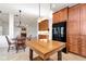 Open kitchen featuring wood cabinets and stainless steel appliances at 2002 Stonewick Ct, Lawrenceville, GA 30043