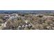 An aerial view showcases a neighborhood with mature trees and houses and a property pin at 2108 Main Nw St, Atlanta, GA 30318
