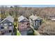 Homes from an aerial perspective, highlighting backyard spaces and the surrounding trees at 2108 Main Nw St, Atlanta, GA 30318