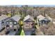 Aerial view of the homes exterior, showcasing the surrounding neighborhood and mature trees at 2108 Main Nw St, Atlanta, GA 30318