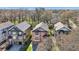 Wide aerial shot of the home, showcasing its location in a tree-lined neighborhood at 2108 Main Nw St, Atlanta, GA 30318