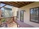Well maintained wood back deck with access to backyard and a view of surrounding greenery at 2108 Main Nw St, Atlanta, GA 30318