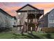 Features a multi-tiered deck perfect for entertaining, overlooking a well-manicured lawn at 2108 Main Nw St, Atlanta, GA 30318