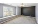 Comfortable bedroom featuring neutral tones, large windows, and a cozy window seat at 2108 Main Nw St, Atlanta, GA 30318
