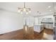Empty dining area with view into the kitchen area at 2108 Main Nw St, Atlanta, GA 30318