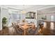 Dining room with views of an open kitchen and a bay window at 2108 Main Nw St, Atlanta, GA 30318