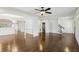 Spacious living room features gleaming hardwood floors and white trim throughout at 2108 Main Nw St, Atlanta, GA 30318