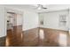 Open living room with hardwood flooring and view into the kitchen at 2108 Main Nw St, Atlanta, GA 30318