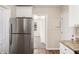 Functional kitchen layout with stainless steel appliances, granite counters, and neutral walls and cabinets at 2203 Knoll Dr, Decatur, GA 30032