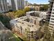 Aerial view of the complex surrounded by greenery, showcasing its urban location and expansive layout at 244 13Th Ne St # 302, Atlanta, GA 30309