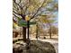 Outdoor view of a directional sign with a well-maintained landscape under a canopy of trees at 244 13Th Ne St # 302, Atlanta, GA 30309
