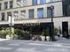 Charming view of Serena Pastificio, a nearby restaurant with outdoor plants and seating at 244 13Th Ne St # 302, Atlanta, GA 30309