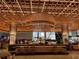 Modern restaurant interior with a full bar with counter seating and stylish decor at 244 13Th Ne St # 302, Atlanta, GA 30309