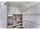 Walk-in closet featuring built-in shelving units for efficient storage and organization at 244 13Th Ne St # 302, Atlanta, GA 30309