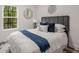 Comfortable bedroom featuring a large window, a plush bed, and neutral walls at 3165 Dogwood Dr # 107, Hapeville, GA 30354