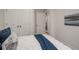 Bedroom featuring a gray wall color, a comfortable bed, and a closet at 3165 Dogwood Dr # 107, Hapeville, GA 30354