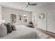 Comfortable bedroom showcasing three windows, a ceiling fan and a neutral color palette at 3165 Dogwood Dr # 107, Hapeville, GA 30354