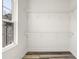 Walk in closet features wire shelving and window allowing natural light at 3165 Dogwood Dr # 107, Hapeville, GA 30354