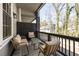 Relaxing patio area with comfortable seating, views of the lush greenery, and a cozy ambiance at 3165 Dogwood Dr # 107, Hapeville, GA 30354