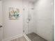 Contemporary shower with glass enclosure and rainfall shower head, plus marble-look walls at 3165 Dogwood Dr # 107, Hapeville, GA 30354