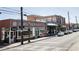 Charming street view with local businesses, storefronts, and street parking for easy access to amenities at 3165 Dogwood Dr # 107, Hapeville, GA 30354