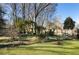 A verdant backyard offering privacy and space for outdoor activities and relaxation at 6784 Tilton Ln, Peachtree Corners, GA 30360