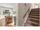 Eat-in kitchen features a sunlit breakfast nook with wood floors and a view of the backyard at 6784 Tilton Ln, Peachtree Corners, GA 30360