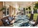 Inviting covered patio with comfortable seating and charming decor at 6784 Tilton Ln, Peachtree Corners, GA 30360
