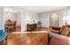 Spacious living room with hardwood floors and an open layout at 6784 Tilton Ln, Peachtree Corners, GA 30360